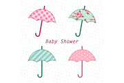 Cute vintage baby shower card with umbrella as fabric applique