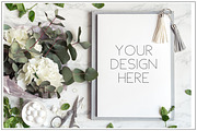 Notepad mockup with flowers.