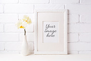 White frame mockup with yellow orhid