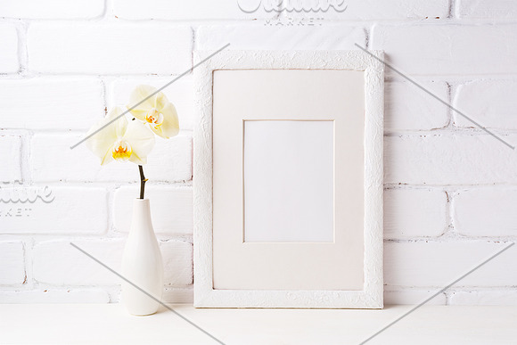 White frame mockup with yellow orhid in Print Mockups - product preview 2