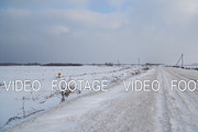 Winter landscape of fields and roads.