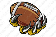 Monster animal claw holding American Football Ball