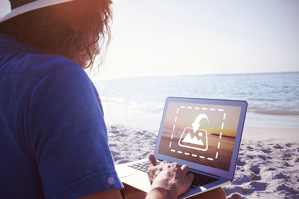 Man Using Laptop On Beach Mockup in Templates - product preview 8
