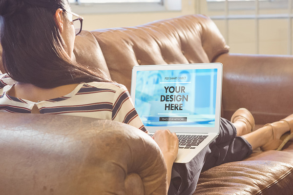 Woman On Sofa With Laptop Mockup