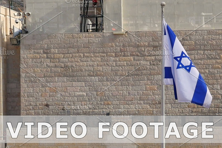 Flag of Israel is waving and flying on the wind