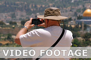 Tourist takes a photo of Jerusalem Old City view