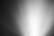 Bottom black and white ray of light bokeh background