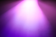Diagonal purple pink light from top bokeh background