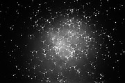 Horizontal black and white particles in space