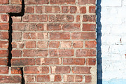Red Brick Wall beside White Brick