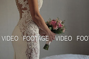 bridal Beautiful bouquet in hands of bride ,white wedding dress