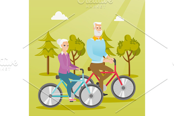 Happy senior couple riding on bicycles in park.
