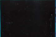 Chroma Dust on black texture background