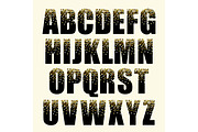 Festive luxury alphabet letters with glamour golden glitter confetti