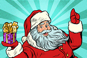 Santa Claus with gift. New year and Christmas