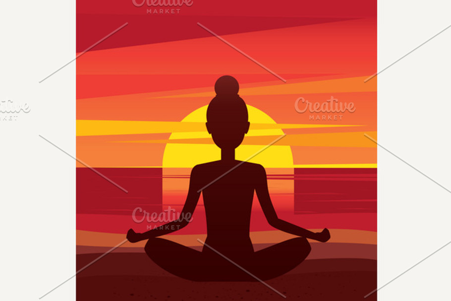 Woman sitting in yoga pose padmasana on the beach
