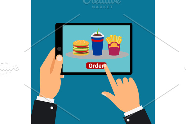Hand holding tablet, order fast food