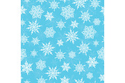 Vector blue white hand drawn christmass snowflakes repeat seamless pattern background. Can be used for fabric, wallpaper, stationery, packaging.