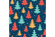 Vector blue, red, and yellow scattered christmas trees winter holiday seamless pattern on dark blue background. Great for fabric, wallpaper, packaging, giftwrap.
