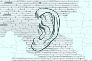 ear graffiti tattoo silhouette on a background old walls