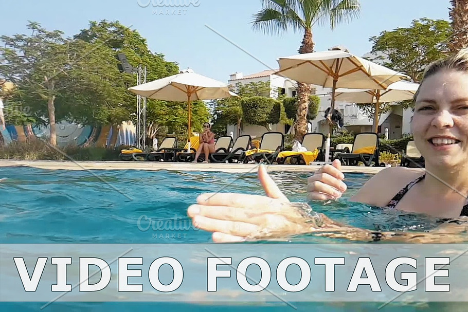Pretty woman in swimming pool in slow motion in Graphics - product preview 8