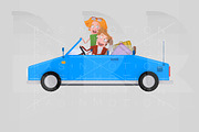 Couple driving convertible blue car
