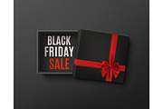 Black Friday sale design. Black empty gift box with red bow.