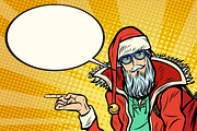 Hipster Santa Claus shows sideways and says comic cloud