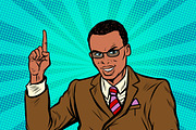 African businessman pointing finger up