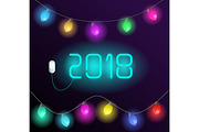 Neon message "2018" and garland