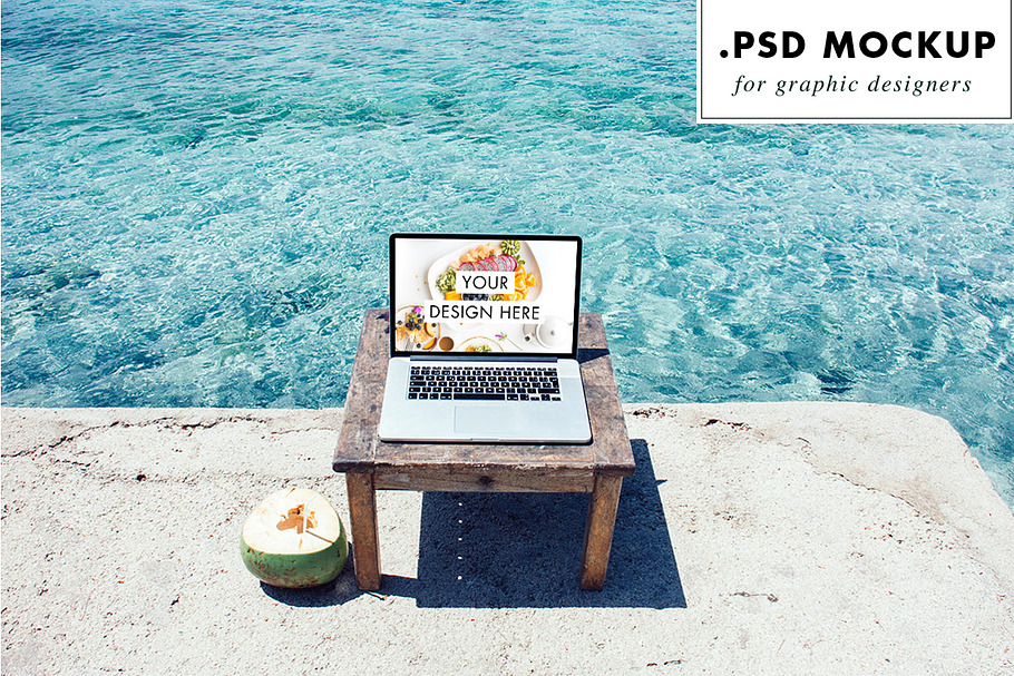 Laptop PSD mockup at the beach