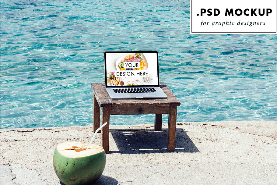 Laptop PSD mockup at the beach