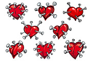 Red hearts pierced by nails