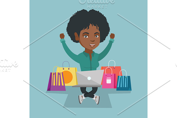 African woman using a laptop for online shopping