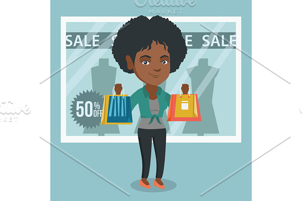 Young african-american woman shopping on sale.