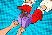 Santa Claus gives Christmas gift