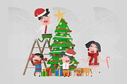 Happy family decorating Christmas Tr