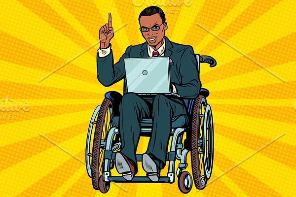 African businessman in wheelchair with laptop