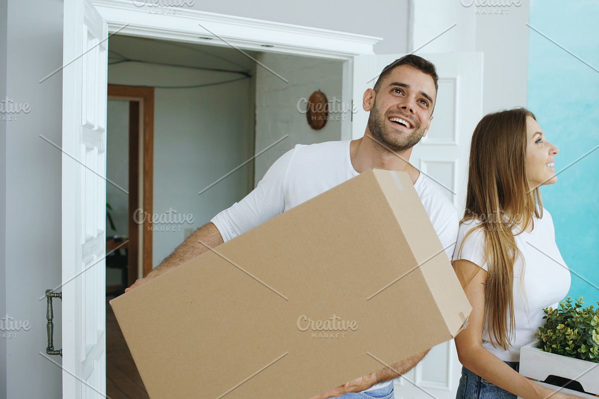 Young happy couple walking in new house after relocation in Graphics - product preview 8