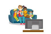 Multiracial family watching television at home.