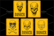 Skull on sign danger.