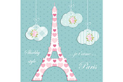Valentines day background as patchwork fabric Eiffel tower of Paris with hearts on strings