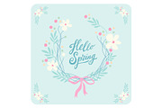 Cute rustic hand drawn Easter wreath of spring flowers with hand written text Hello Spring