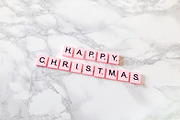 Happy Christmas in pink letters