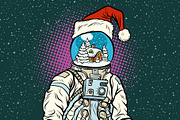 Christmas astronaut with dreams of gingerbread house