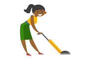 Young african woman cleaning with vacuum cleaner.