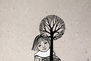 girl holding tree