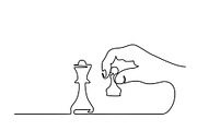 Hand holding chess