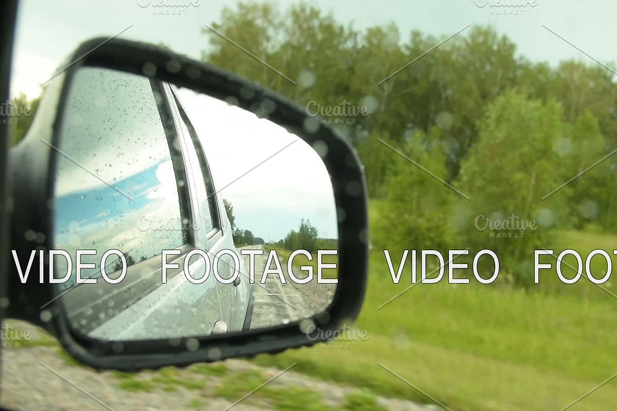 Reflection of side-view mirror of car driving in the countryside on rainy day in Graphics - product preview 8