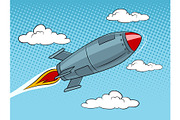 Rocket missile flying pop art style vector